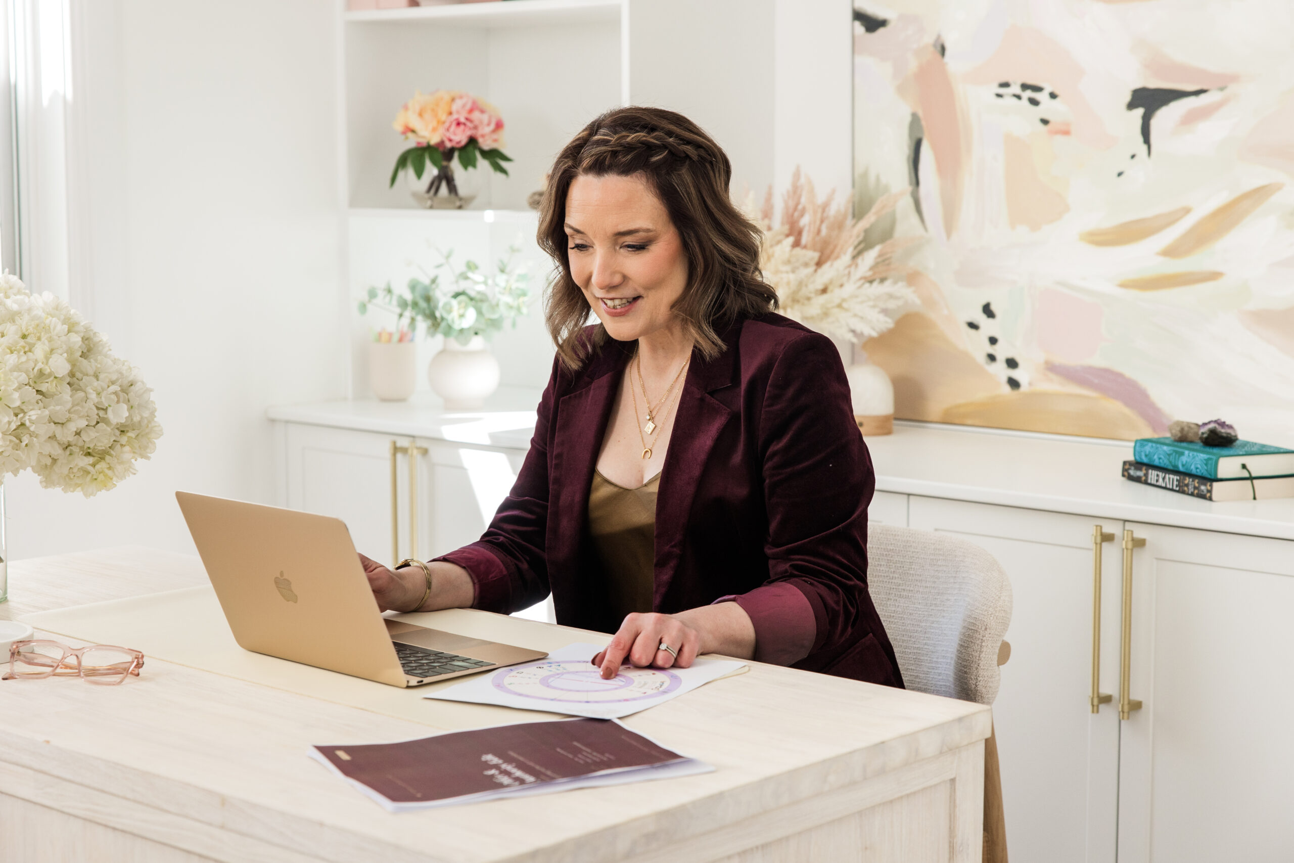Kathryn Hocking reading a natal chart through a business lens